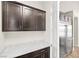 Large pantry with stainless steel refrigerator and ample counter space at 865 Auroras Edge Ct, Henderson, NV 89012