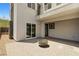 A stylish patio offers an outdoor living space complete with paving stones and mountain views at 865 Auroras Edge Ct, Henderson, NV 89012