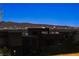 Breathtaking night skyline view showcasing city lights and the distant mountain range at 865 Auroras Edge Ct, Henderson, NV 89012