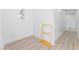Empty room leading to hallway with natural light from a window at 9319 White Waterfall Ave, Las Vegas, NV 89149