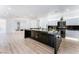 Spacious open-concept kitchen features a large island and modern countertops at 9319 White Waterfall Ave, Las Vegas, NV 89149