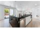 Modern kitchen island offers sleek design, ample counter space, and built-in features at 9319 White Waterfall Ave, Las Vegas, NV 89149