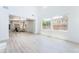 Bright and airy living room leads to a dining area and kitchen at 9319 White Waterfall Ave, Las Vegas, NV 89149