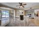 Inviting dining room with sliding doors to patio and view of pool at 9333 Dry Dock Dr, Las Vegas, NV 89117