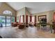 Bright living room with vaulted ceilings, stylish decor and backyard access at 9333 Dry Dock Dr, Las Vegas, NV 89117