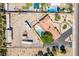 Drone's-eye view revealing lush landscaping, pool and RV parking area at 9660 W Ann Rd, Las Vegas, NV 89149