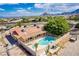 Beautifully landscaped home featuring a pool and outdoor amenities in a serene setting at 9660 W Ann Rd, Las Vegas, NV 89149