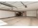 Spacious garage with ample storage cabinets and epoxy floor coating at 9660 W Ann Rd, Las Vegas, NV 89149