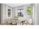 Bright dining room with large windows, hardwood floors, and an outdoor view at 12212 Elderwood St, Las Vegas, NV 89138