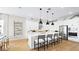 Modern kitchen with white cabinets, marble countertops, and stainless steel appliances at 12212 Elderwood St, Las Vegas, NV 89138
