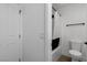 Functional bathroom features a toilet, shower with curtain, and a clean, neutral color scheme at 1551 Boundary Peak Way, Las Vegas, NV 89135