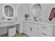 Elegant bathroom vanity featuring dual sinks, sleek fixtures, and a comfortable stool, designed for modern living at 1551 Boundary Peak Way, Las Vegas, NV 89135