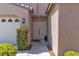 Inviting front entrance with a double door, a welcoming 'hello' mat, and fresh landscaping at 1551 Boundary Peak Way, Las Vegas, NV 89135
