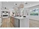 Modern kitchen featuring a spacious island, modern finishes, and ample natural light at 1551 Boundary Peak Way, Las Vegas, NV 89135