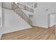Staircase with sleek metal railings, ascending into an open and airy living space at 1551 Boundary Peak Way, Las Vegas, NV 89135