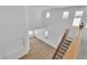 Second story view of staircase leading into open floor plan below at 1551 Boundary Peak Way, Las Vegas, NV 89135