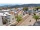 Desert community featuring stucco homes, terracotta roofs, xeriscaping, and mountain views at 2152 High Dunes Ln, Laughlin, NV 89029