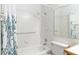 Bathroom features a shower, bathtub, tiled walls, and a storage area at 2152 High Dunes Ln, Laughlin, NV 89029