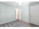 Bedroom features neutral walls, carpet, ceiling fan, and a closet at 2152 High Dunes Ln, Laughlin, NV 89029