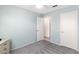 Bedroom features neutral walls, carpet, ceiling fan, and closet door at 2152 High Dunes Ln, Laughlin, NV 89029