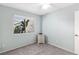 Bright bedroom with natural light, neutral walls, and carpeted floors at 2152 High Dunes Ln, Laughlin, NV 89029