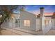 Charming single-Gathering home featuring a cozy front yard with secure white picket fence and desert landscaping at 2152 High Dunes Ln, Laughlin, NV 89029