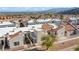 Multi-unit townhome boasts red tile roof with desert landscaping at 2152 High Dunes Ln, Laughlin, NV 89029