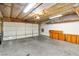 Spacious garage with insulated ceiling, concrete floor, and paneled garage door at 2152 High Dunes Ln, Laughlin, NV 89029
