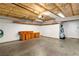 Unfinished garage with concrete floor, insulated ceiling, and wall storage at 2152 High Dunes Ln, Laughlin, NV 89029