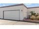 Attached garage with textured exterior, adjacent to desert landscaping at 2152 High Dunes Ln, Laughlin, NV 89029