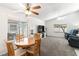 Open-plan living area with dining table, TV, and comfortable seating at 2152 High Dunes Ln, Laughlin, NV 89029