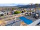 Community pool with gazebo seating, surrounded by lush landscaping and great city views at 2152 High Dunes Ln, Laughlin, NV 89029