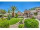 Attractive single-story home featuring a manicured front yard with desert landscaping and a courtyard entry at 2225 Blackburn Hills Ave, Henderson, NV 89044