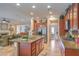 Open-concept kitchen with island, modern appliances, and access to the living area at 2225 Blackburn Hills Ave, Henderson, NV 89044