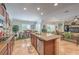 Bright kitchen featuring stainless appliances, tile floors, and open layout at 2225 Blackburn Hills Ave, Henderson, NV 89044