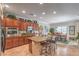 Spacious kitchen with island, tile floors, and open to the dining room at 2225 Blackburn Hills Ave, Henderson, NV 89044