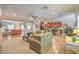 Open-concept living area with access to the kitchen and dining spaces at 2225 Blackburn Hills Ave, Henderson, NV 89044