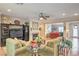 Cozy living room with fireplace, ceiling fan, and comfortable seating at 2225 Blackburn Hills Ave, Henderson, NV 89044