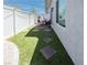 Charming backyard with stone pavers, well-kept artificial grass and a lovely patio area at 226 Callen Falls Ave # 1311, Henderson, NV 89011