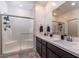 Contemporary bathroom with double sinks, spacious walk-in shower, and sleek fixtures for a luxurious feel at 226 Callen Falls Ave # 1311, Henderson, NV 89011