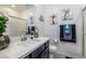 Modern bathroom featuring a glass enclosed shower and fresh white cabinets providing a spa-like retreat at 226 Callen Falls Ave # 1311, Henderson, NV 89011