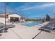 A refreshing community pool is surrounded by lounge chairs, offering a relaxing oasis at 226 Callen Falls Ave # 1311, Henderson, NV 89011