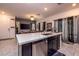 Contemporary kitchen with a large island, stainless steel appliances, and seamless access to the living area at 226 Callen Falls Ave # 1311, Henderson, NV 89011