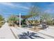 Community playground and seating with shade covers along a beautiful street at 226 Callen Falls Ave # 1311, Henderson, NV 89011
