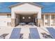 Resort-style poolside lounge area featuring covered seating and convenient outdoor showers at 226 Callen Falls Ave # 1311, Henderson, NV 89011