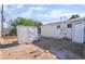 Backyard featuring a utility shed and partial landscaping at 2532 Arrowhead St, North Las Vegas, NV 89030