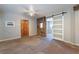This bedroom has natural stone floors and a sliding barn door at 2532 Arrowhead St, North Las Vegas, NV 89030