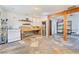 Rustic kitchen with stone countertops and unique flooring that adds character to the home at 2532 Arrowhead St, North Las Vegas, NV 89030