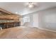 Living room with tile floors, ceiling fan, and refrigerator at 2532 Arrowhead St, North Las Vegas, NV 89030