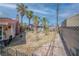 Spacious backyard surrounded with mature trees and fence for privacy at 2880 Placita Ct, Las Vegas, NV 89121